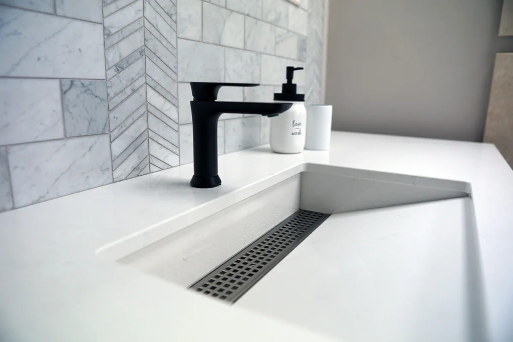 bathroom backsplash, countertop and sink