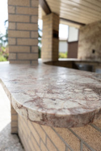 radiused edge in granite countertop for outside bbq area